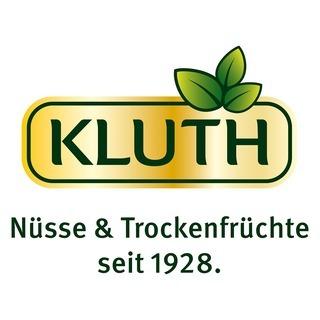 Logo der Marke Kluth mit dem Slogan &bdquo;N&uuml;sse & Trockenfr&uuml;chte seit 1928&ldquo; und zwei gr&uuml;nen Bl&auml;ttern.